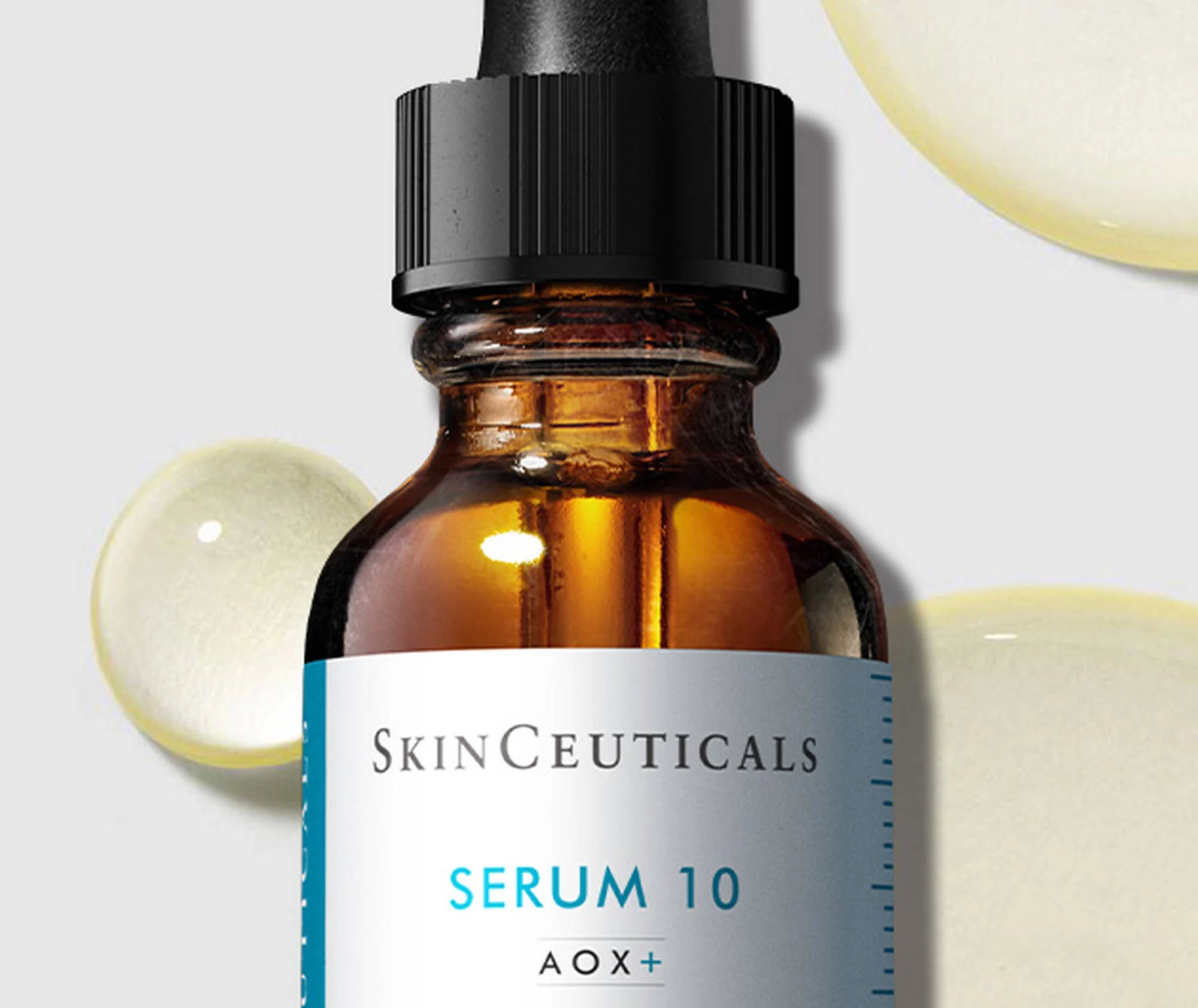 SkinCeuticals Serum 10 bottle with dropper on a light background