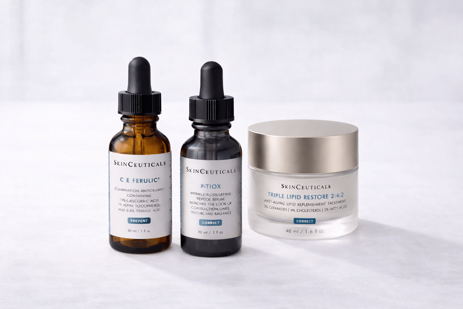 Three SkinCeuticals skincare products on a white background