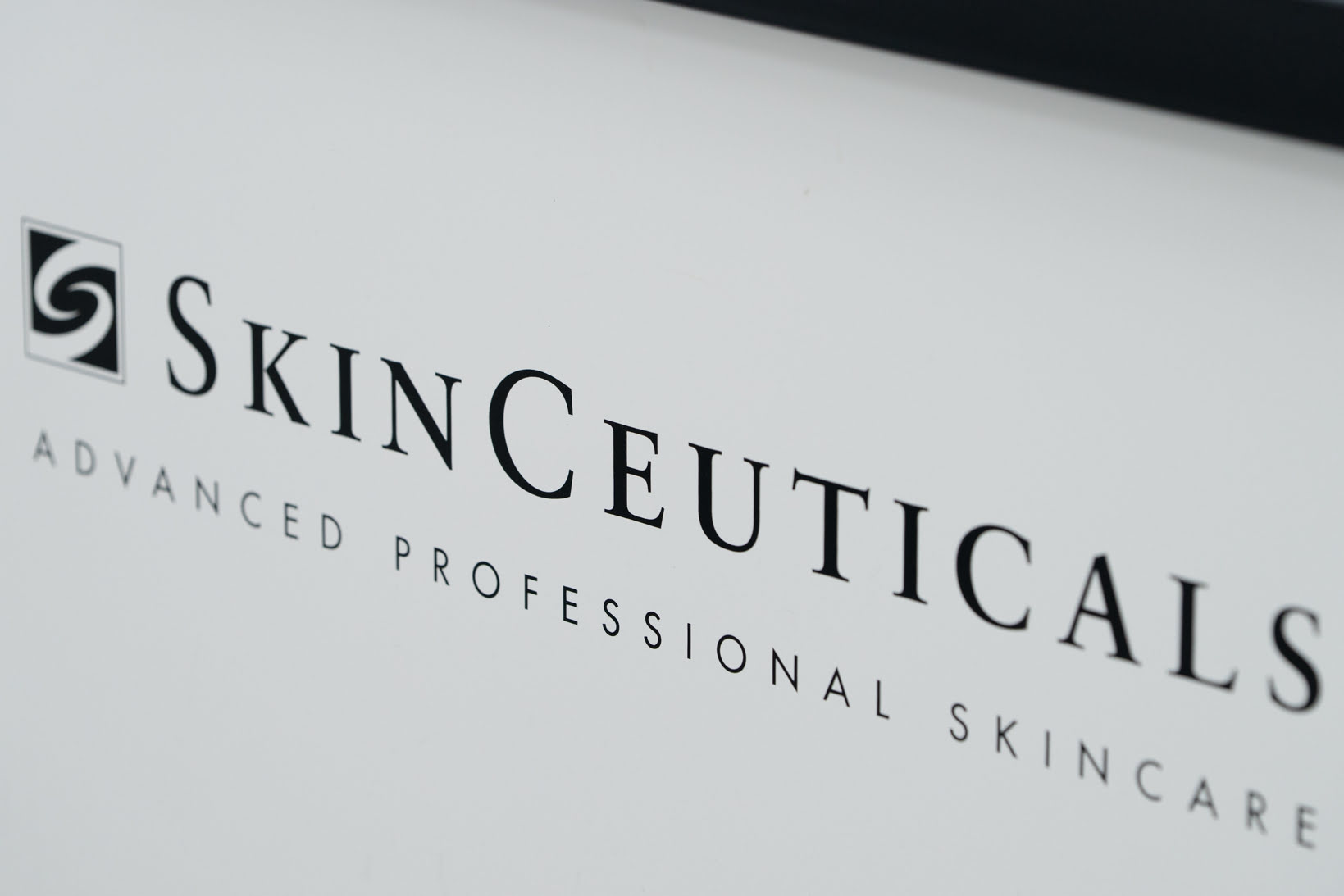 SkinCeuticals skincare product packaging with brand name and description.