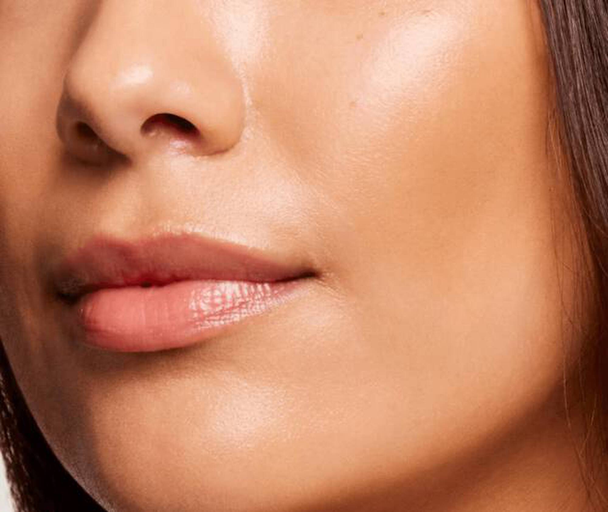 Close-up of a person's face with a focus on the lips.
