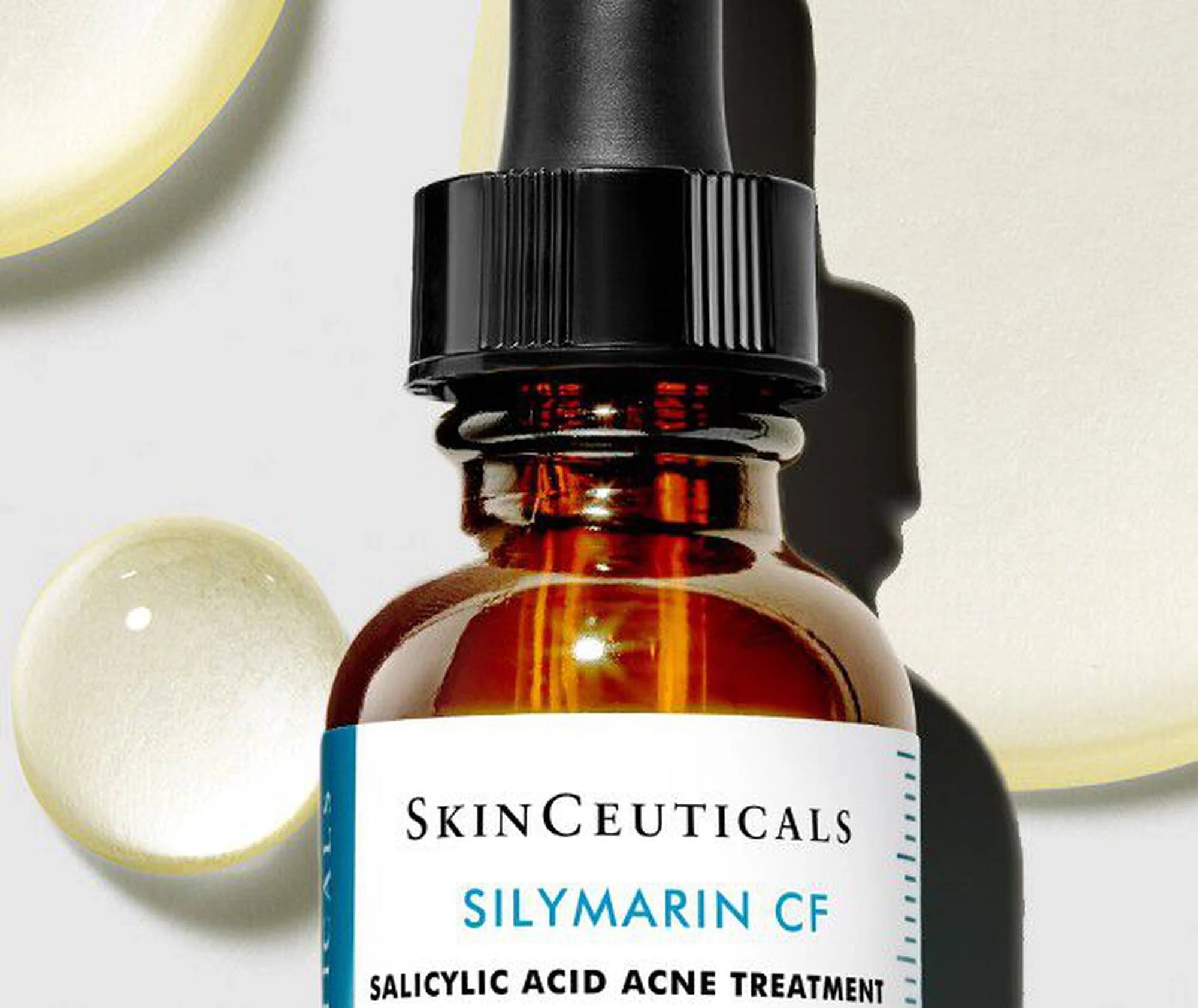 SkinCeuticals Silymarin CF bottle with dropper on a light background