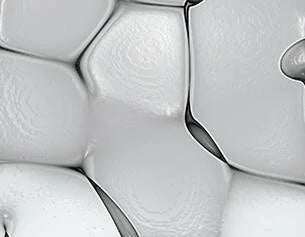 Close-up of a white soccer ball with visible hexagonal panels.