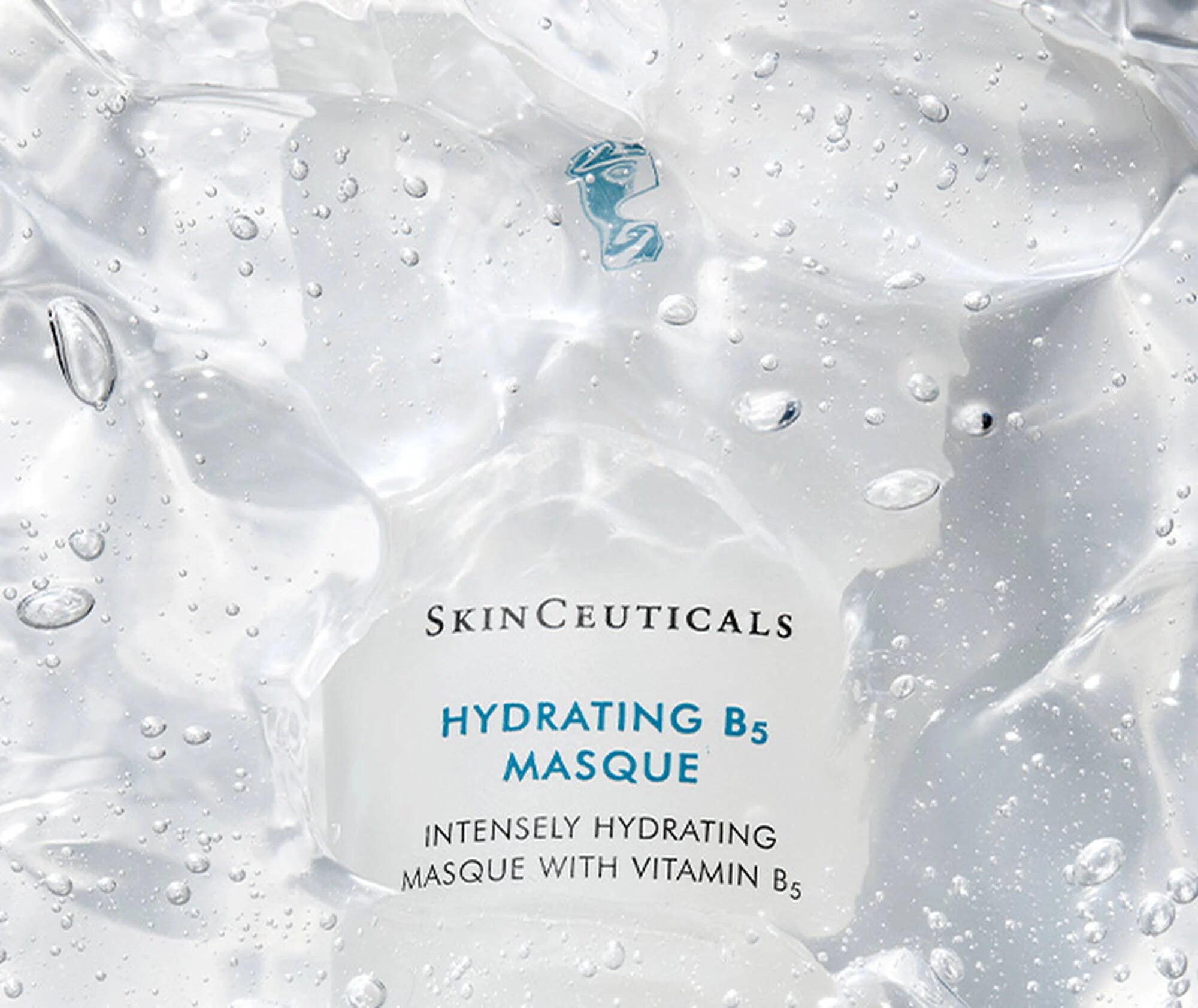 SkinCeuticals Hydrating B5 Masque packaging with a close-up of the product on a textured background.
