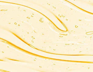 Close-up of a textured beige surface with gold lines