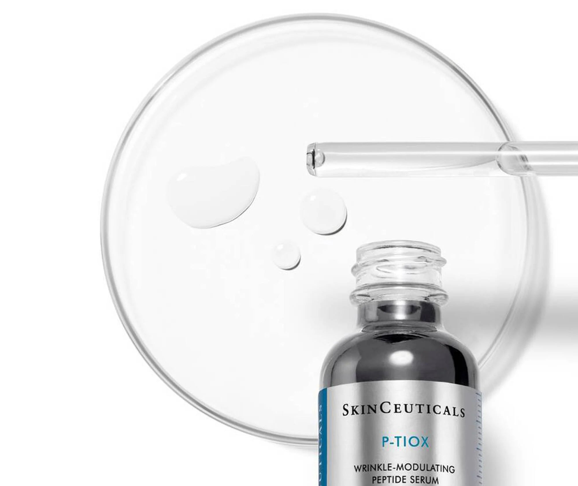 SkinCeuticals P-TIOX serum bottle with dropper on a white background