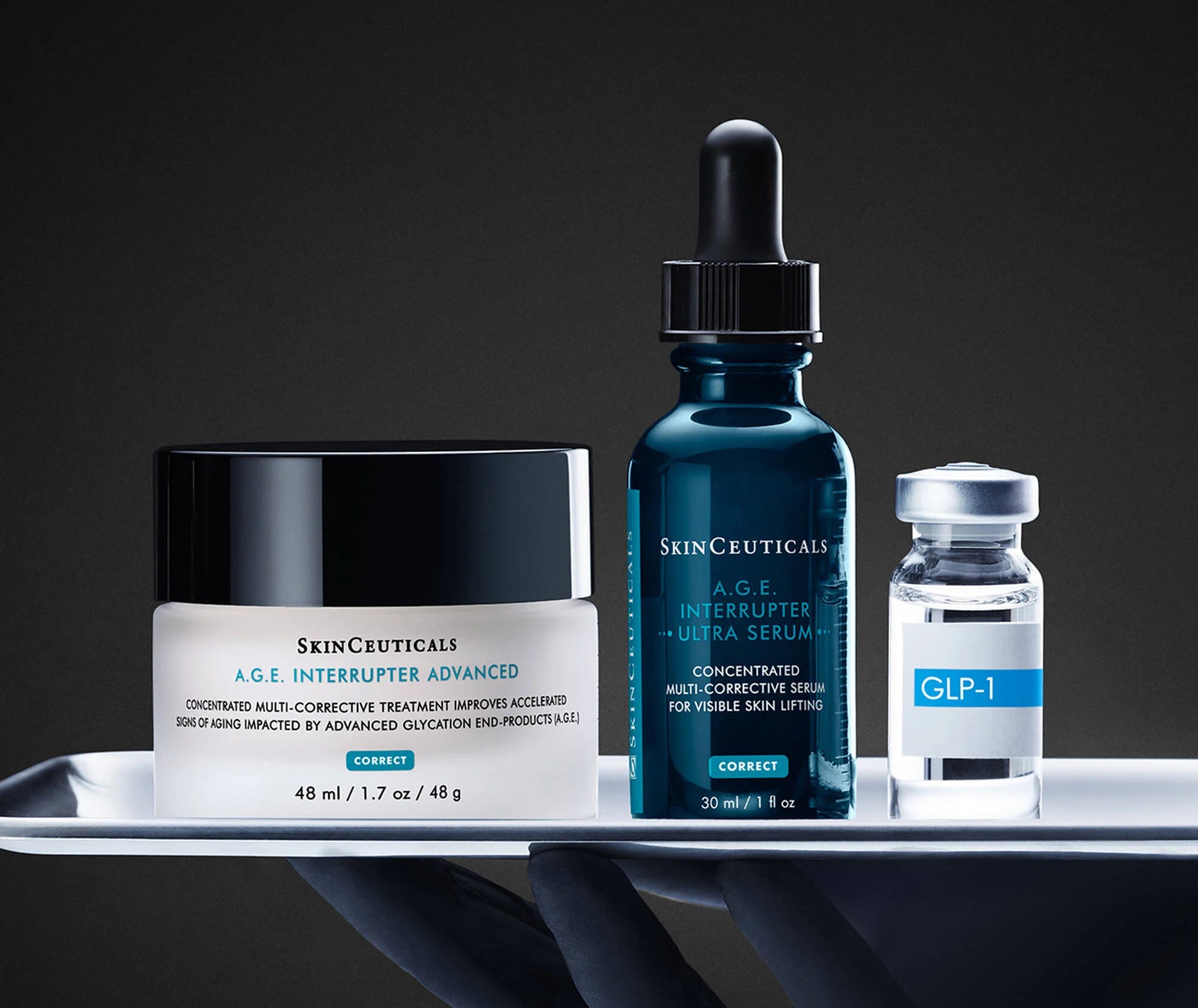Three skincare products from SkinCeuticals on a dark background