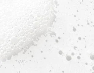 Close-up of white beads on a light gray background