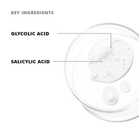 Glass bowl with a white substance labeled 'Key Ingredients' as Glycolic Acid and Salicylic Acid.