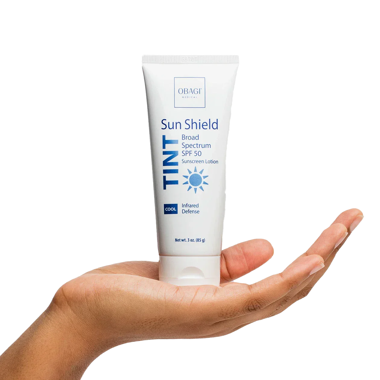Tube of Obagi Sun Shield Tinted Broad Spectrum SPF 50 on a hand against a white background