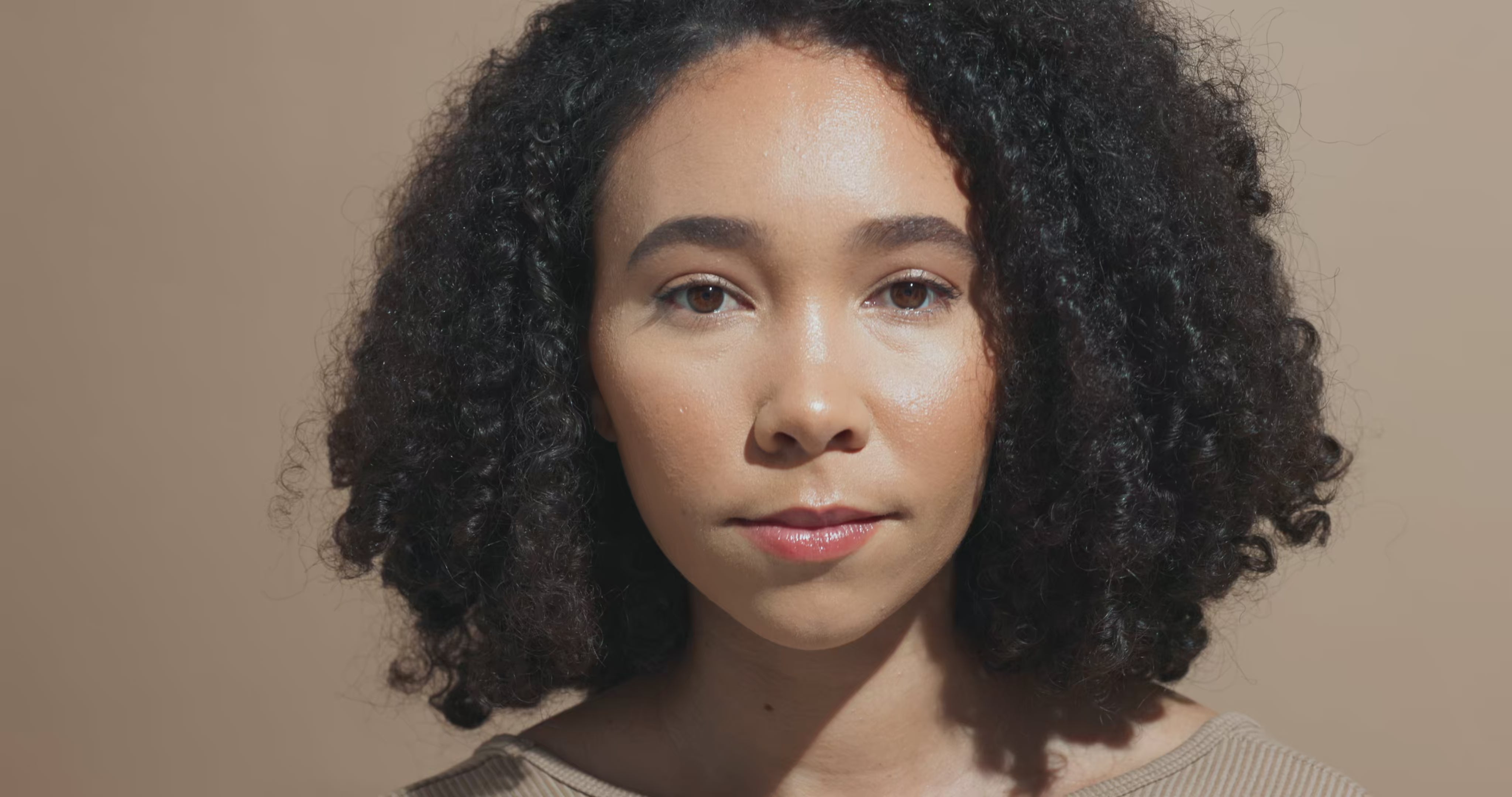 Load video: Video featuring diverse women with different skin types smiling; individual shots transition to a final scene where all models stand together, showcasing healthy, radiant skin
