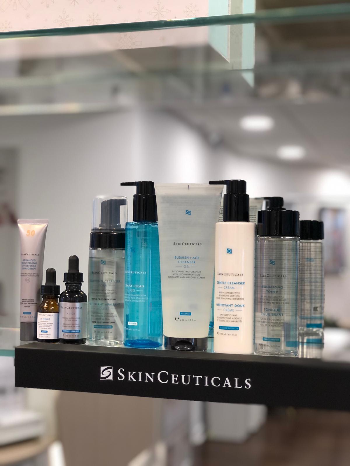 Collection of SkinCeuticals skincare products on a shelf.