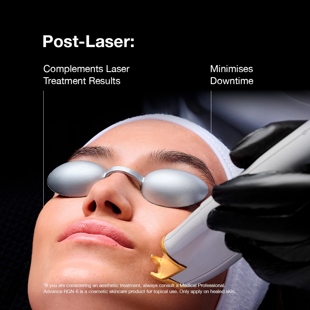 Person receiving laser treatment with protective goggles on a black background